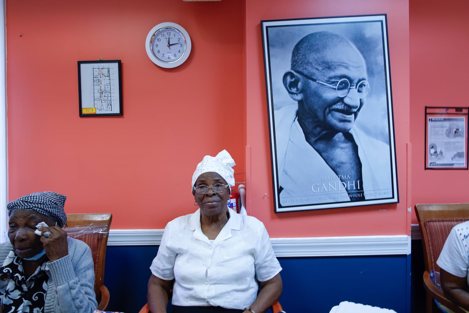 Haitian Theomene Valentine, 84, waits for lunch at Sunshine Adult Day Center in Bergenfield, N.J., Monday, Aug. 26, 2024. (AP Photo/Kena Betancur)