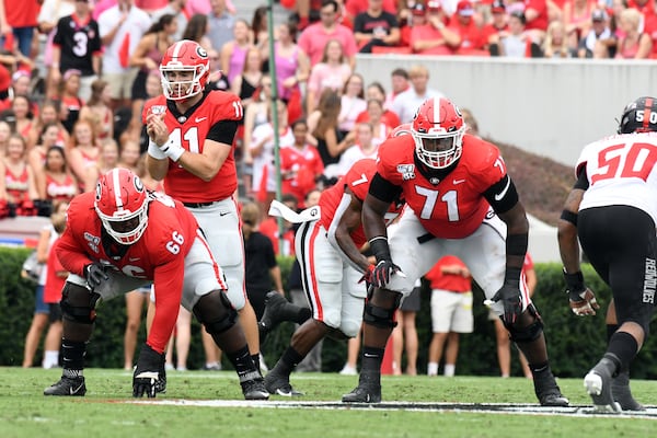 Georgia offensive lineman Solomon Kindley (66)
Georgia offensive tackle Andrew Thomas (71)

Athens, GA - The #3-ranked University of Georgia football team defeated ArkansasState, 55-0, in a game played on Dooley Field at Sanford Stadium. Photo credit, Perry McIntyre.