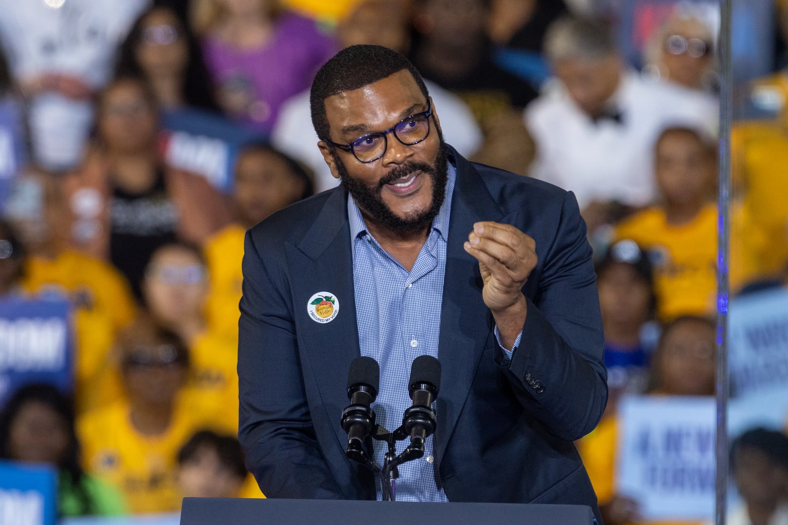 Entertainment guru Tyler Perry speaks during Thursday's rally in Clarkston.