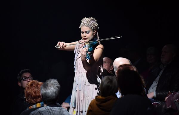 iolinist and vocalist Camilla Bäckman performs from Daydreaming during Cirque du Soleil Volta at Atlantic Station on Thursday, December 12, 2019. (Hyosub Shin / Hyosub.Shin@ajc.com)