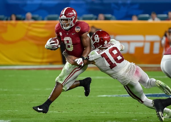 Oklahoma linebacker Curtis Bolton tackles Alabama running back Josh Jacobs in the 2018 Orange Bowl.