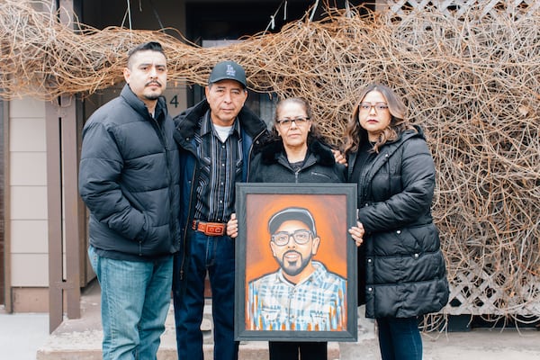 The city of Atlanta paid $3.75 million to the family of Ricardo Dorado Jr. a year after his fatal arrest. His family (from left), brother, Humberto Dorado, father, Ricardo Dorado Sr., mother, Josefina Dorado, and sister, Arcelia Beltran, say they are still waiting for justice. (Sarah Mariel for the AJC)