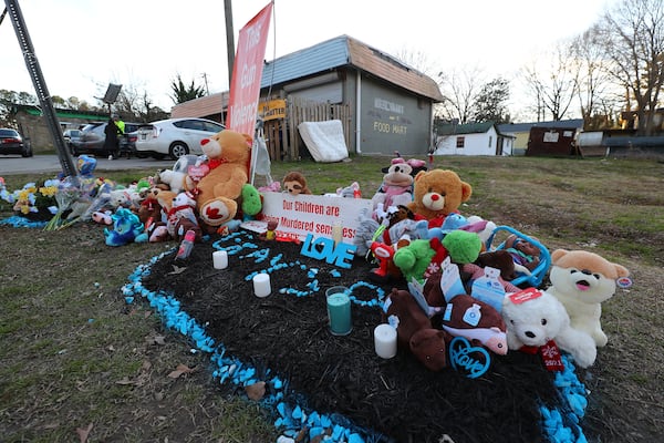 013122 Atlanta: A memorial for 6-month-old Grayson Fleming-Gray is seen outside the Food Mart where he was shot and killed last week in a drive-by shooting on Monday, Jan. 30, 2022, in Atlanta.   “Curtis Compton / Curtis.Compton@ajc.com”`