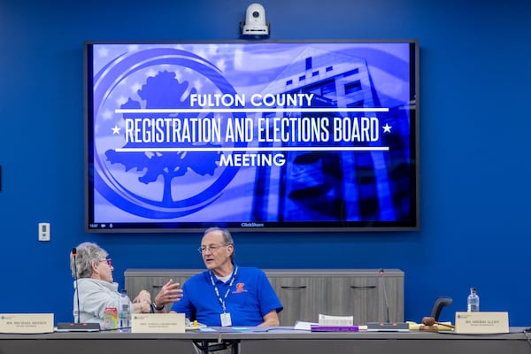 Fulton County Registration and Elections Board members Teresa Crawford and Michael Heekin were at the certification meeting in Union City on Tuesday.