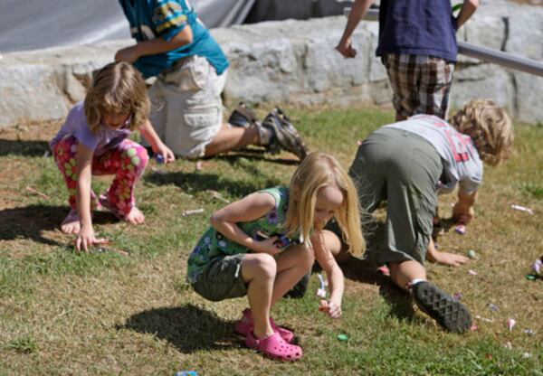 Children made a mad dash for the stage and the free candy there when "Mellotron" singer Melissa Mason tossed a bowl of candy from the stage for them.