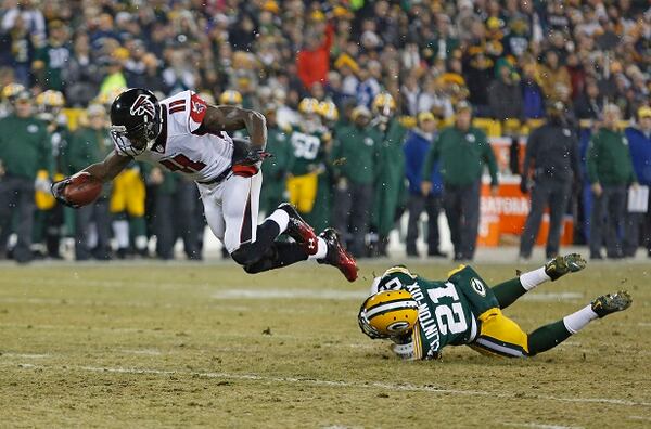 Atlanta Falcons wide receiver Julio Jones is tripped up after making a catch by Green Bay Packers free safety Ha Ha Clinton-Dix during an NFL football game Monday Dec. 8, 2014, in Green Bay, Wis. (AP Photo/Matt Ludtke) Here's Julio, flying for some of those 259 yards. (Matt Ludtke/AP photo)