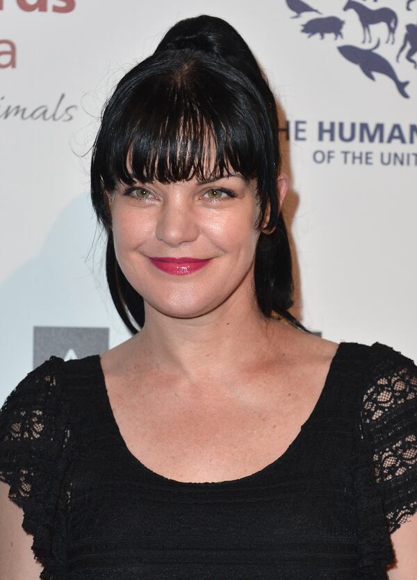 BEVERLY HILLS, CA - MARCH 23: Actress Pauley Perrette arrives to the 2013 Genesis Awards Benefit Gala at The Beverly Hilton Hotel on March 23, 2013 in Beverly Hills, California. (Photo by Alberto E. Rodriguez/Getty Images)