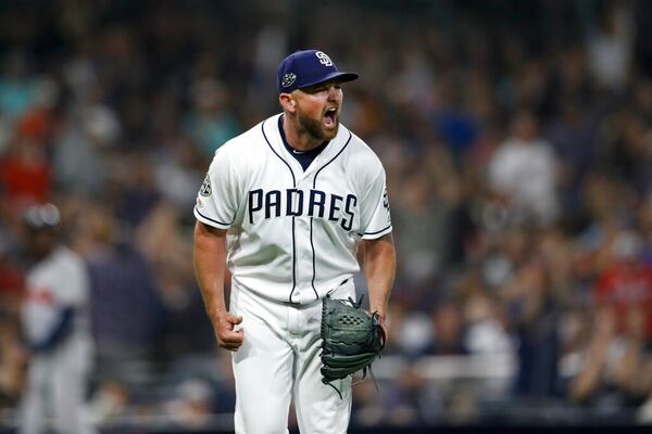 San Diego Padres relief pitcher Kirby Yates reacts after striking out Atlanta Braves' Freddie Freeman during the ninth inning of a baseball game Saturday, July 13, 2019, in San Diego. (AP Photo/Gregory Bull)