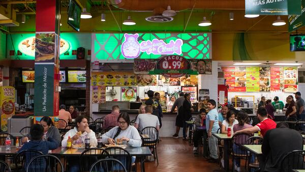 Diners enjoy lunch at Las Recetas y Antojitos de la Abuela, which translates to "Recipes and Treats from Grandma," in the Plaza Fiesta food court.
CHRISTINA MATACOTTA FOR THE ATLANTA JOURNAL-CONSTITUTION.