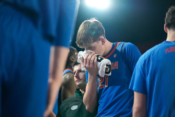 Florida forward Alex Condon (21) is injured during an NCAA college basketball game against Georgia, Tuesday, Feb. 25, 2025, in Athens, Ga. (AP Photo/Brynn Anderson)