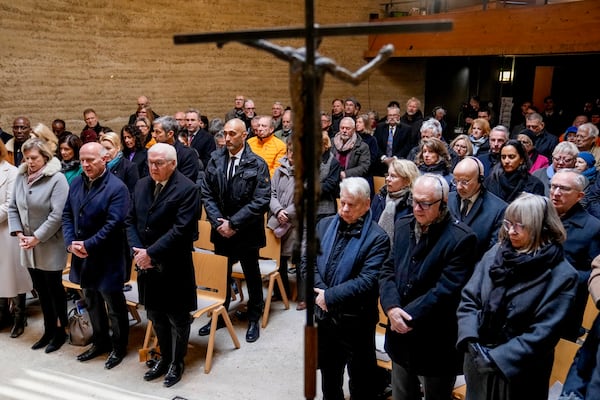 German President Frank-Walter Steinmeier, right, and Berlin mayor Kai Werner attend a church service in the Chapel of Reconciliation on occasion of the 35th wall anniversary, Berlin, Germany, Saturday, Nov.9, 2024. (AP Photo/Ebrahim Noroozi,pool)