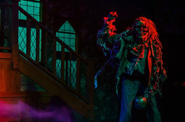 The Ghost of Christmas Past in “Invasion: Christmas Carol” at Dad’s Garage. Contributed by Chelsea Patricia Photo