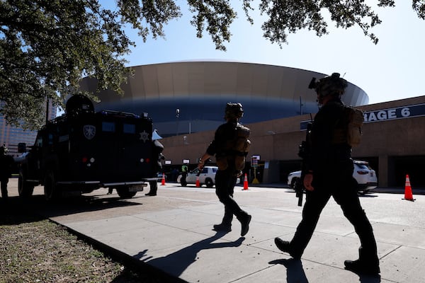 Local SWAT teams patrol outside the Caesars Superdome ahead of the Sugar Bowl NCAA College Football Playoff game, Thursday, Jan. 2, 2025, in New Orleans. (AP Photo/Butch Dill)