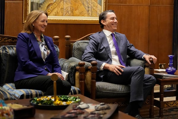 Amos Hochstein, right, a senior adviser to President Joe Biden, and US Ambassador to Lebanon Lisa A. Johnson, left, gesture during their meeting with Lebanese Parliament speaker Nabih Berri, in Beirut, Lebanon, Tuesday, Nov. 19, 2024. (AP Photo/Hassan Ammar)