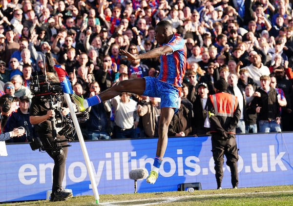 Crystal Palace's Ismaila Sarr celebrates scoring their side's first goal of the game during their English Premier League soccer match against Ipswich Town at Selhurst Park, London, Saturday, March 8, 2025. (Zac Goodwin/PA via AP)