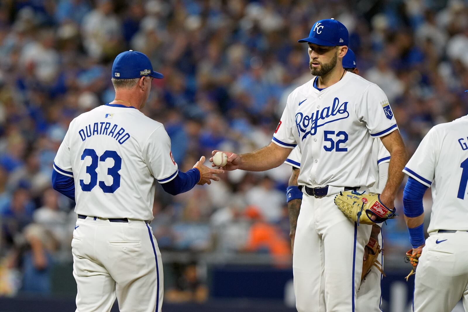 Kansas City Royals starting pitcher Michael Wacha (52) is removed by manager Matt Quatraro (33) during the fifth inning in Game 4 of an American League Division baseball playoff series against the New York Yankees Thursday, Oct. 10, 2024, in Kansas City, Mo. (AP Photo/Charlie Riedel)