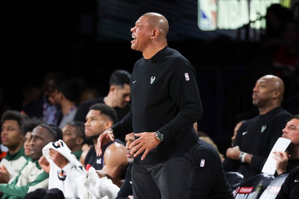 Milwaukee Bucks head coach Doc Rivers, center, yells during the first half of a semifinal game against the Atlanta Hawks in the NBA Cup basketball tournament Saturday, Dec. 14, 2024, in Las Vegas. (AP Photo/Ian Maule)