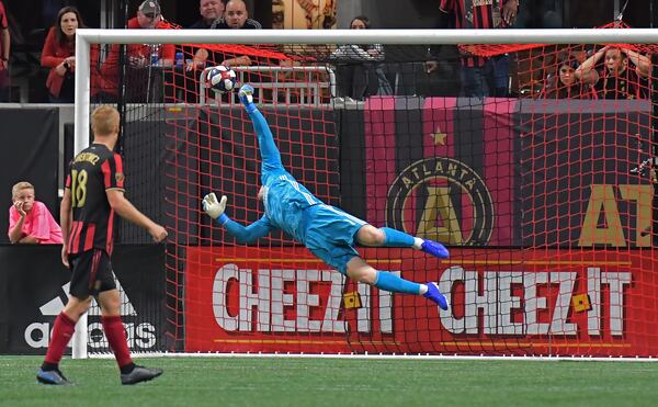 Atlanta United goalkeeper Brad Guzan (1) is not able to stop the game winning goal by Toronto FC midfielder Nick DeLeon (18) in the second half during the Eastern Conference Final soccer match at Mercedes-Benz Stadium on Wednesday, October 30, 2019. Toronto FC won 2-1 over the Atlanta United. (Hyosub Shin / Hyosub.Shin@ajc.com)