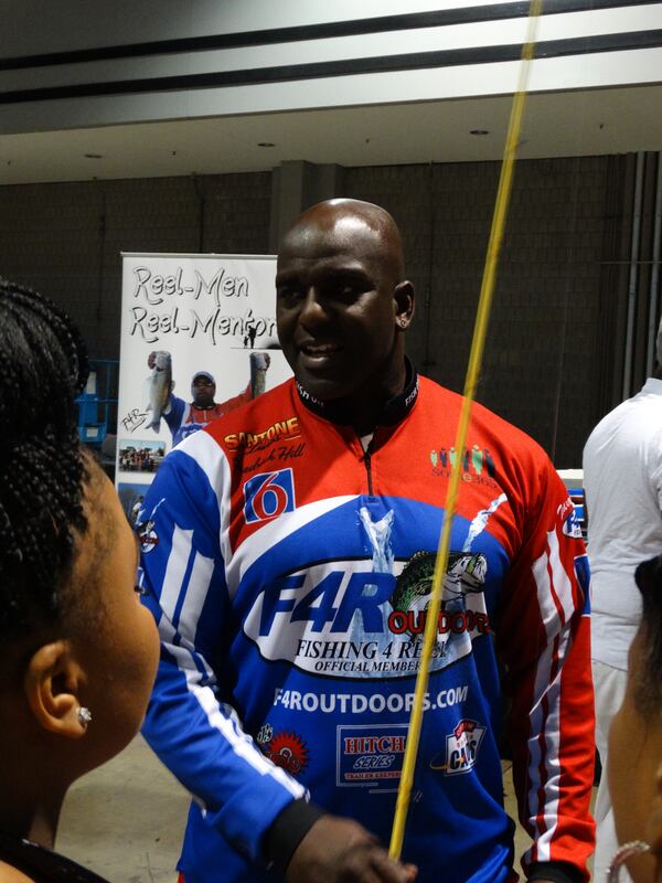 Frederick Hill, a professional bass fisherman, admires Steve Harvey. "He's an outdoor guy and he loves kids, like me. He's a man who keeps his word. That's what we're about!" CREDIT: Rodney Ho/ rho@ajc.com