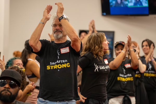 Actor Clayton Landey joins union members of SAG-AFTRA and supporters at a rally to discuss the strike and how important it is in Atlanta on Monday, July 17, 2023. (Katelyn Myrick/katelyn.myrick@ajc.com)