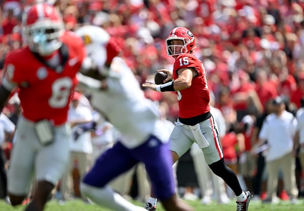 Georgia quarterback Carson Beck (15) gets off a pass during the first half in an NCAA football game at Sanford Stadium, Saturday, September 9, 2024, in Athens. Georgia won 48-3 over Tennessee Tech. (Hyosub Shin / AJC)