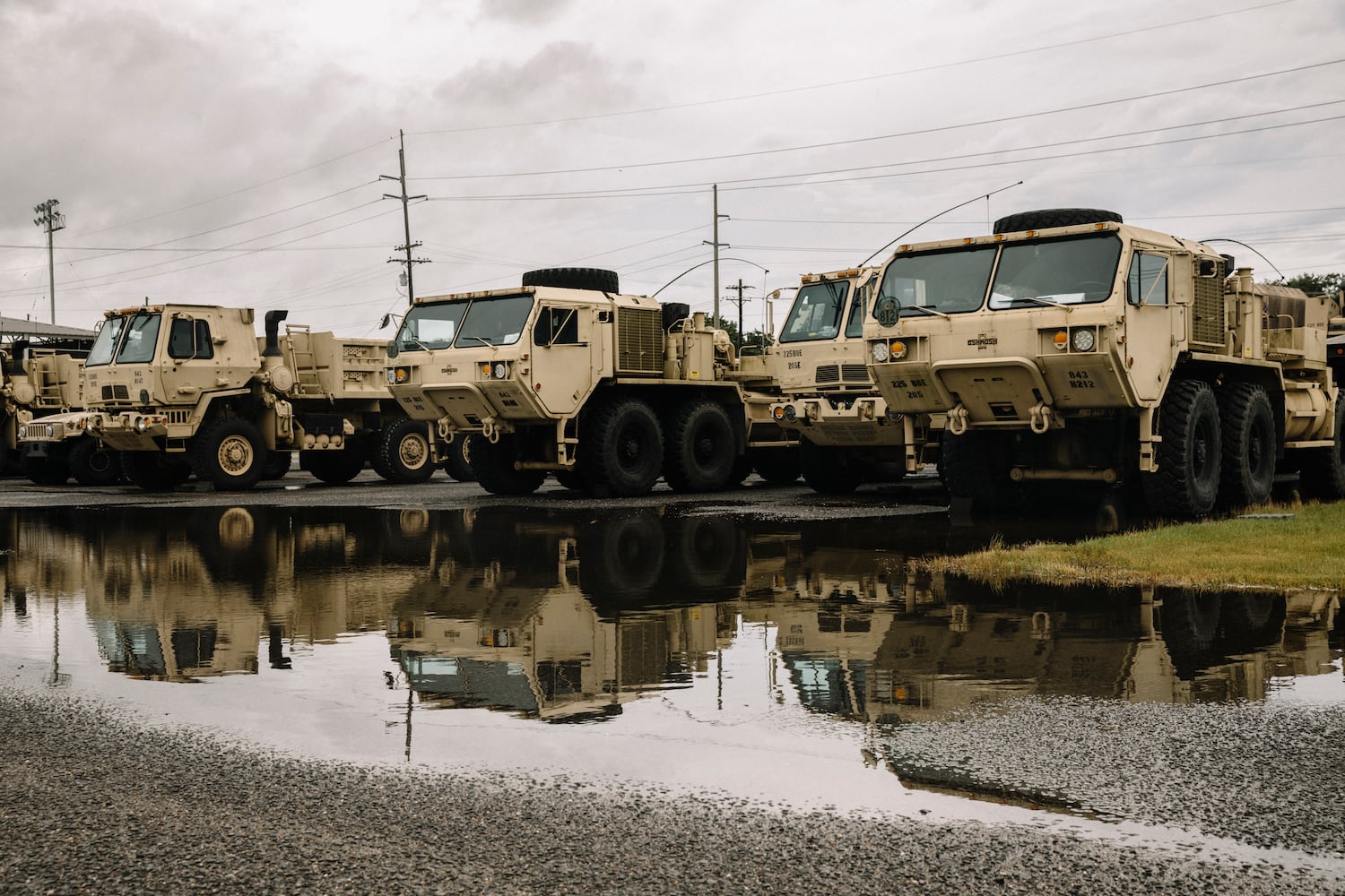 National Guard vehicles are staged and ready for rescue efforts in Lake Charles, La., Wednesday, Aug. 26, 2020, ahead of Hurricane Laura. The city of Lake Charles and members of the U.S. military ran a joint effort to bus citizens out of the mandatory evacuation zone. (William Widmer/The New York Times)