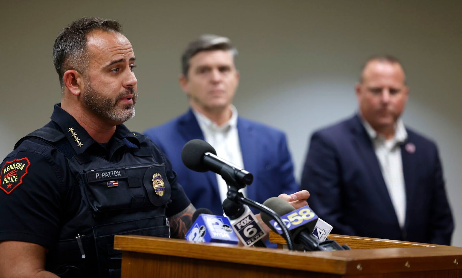 Kenosha Police Chief Patrick Patton, left, speaks as KUSD Superintendent Jeffrey Weiss, center, and Mayor David Bogdala listen during a news conference during at the KUSD Educational Support Center on Thursday, Nov. 7, 2024 in Kenosha, Wis. (Sean Krajacic/The Kenosha News via AP)