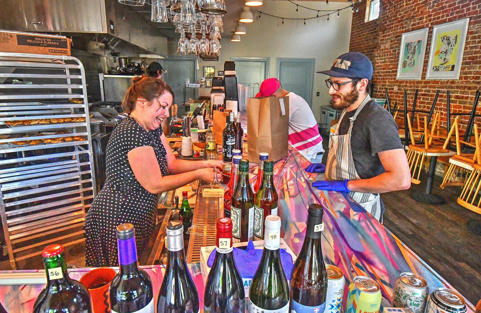 Chef Jarrett Stieber (right) with general manger/bar manager Kate Flowe at Little Bear. CONTRIBUTED BY CHRIS HUNT PHOTOGRAPHY