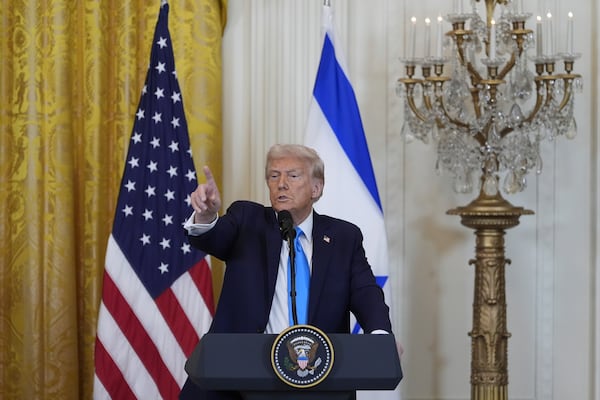 President Donald Trump and Israeli Prime Minister Benjamin Netanyahu take questions during a news conference in the East Room of the White House on Feb. 4 in Washington, D.C. Alex Brandon/AP