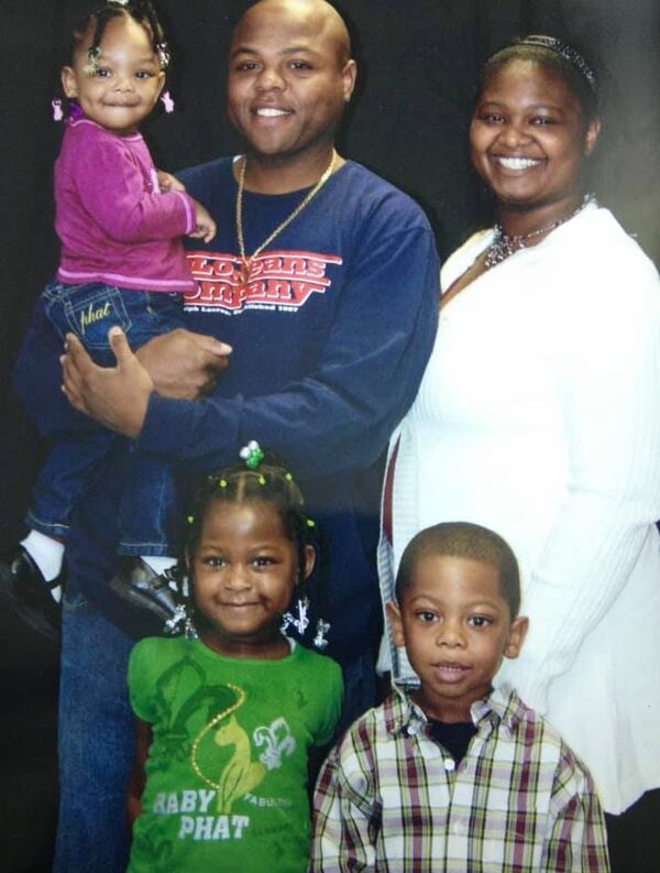 Shortly before he was deployed to Afghanistan, Staff Sergeant Alex French IV was home with his young family in Milledgeville. Holding his daughter, Madison, his wife Shanoca is next to him. His twins, Alexis and Alex V pose in front. 
French IV was killed in action on Sept. 30, 2009.