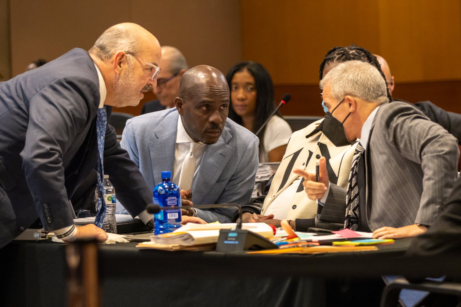 Defense attorneys Doug Weinstein, Keith Adams and Brian Steel confer during the YSL trial, featuring Atlanta rapper Young Thug, at the Fulton County Courthouse in Atlanta on Monday, August 12, 2024. (Arvin Temkar / AJC)