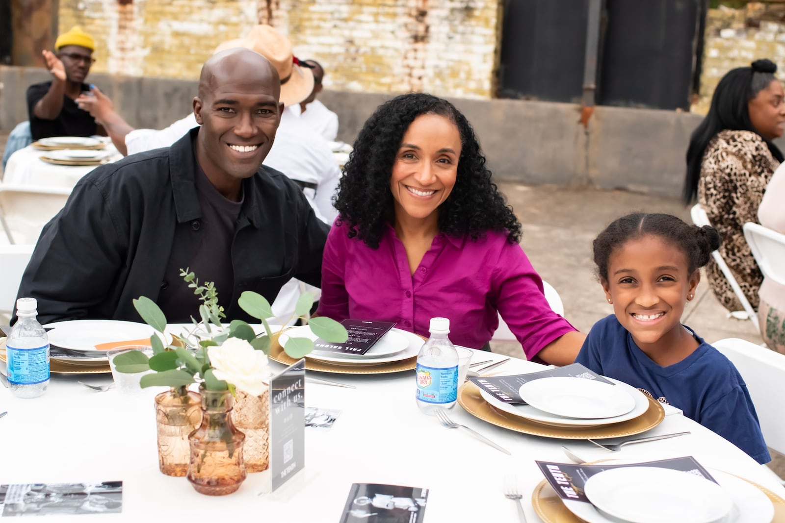 Justin, Kailei and Adrienne Carr, members of The Tenth, attend a supper club event hosted by Nasim and Clint Fluker.