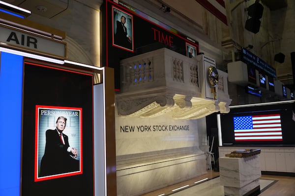 A cover of Time magazine's person of the year, shows President-elect Donald Trump, before a ceremony at the New York Stock Exchange, Thursday, Dec. 12, 2024, in New York. (AP Photo/Alex Brandon)