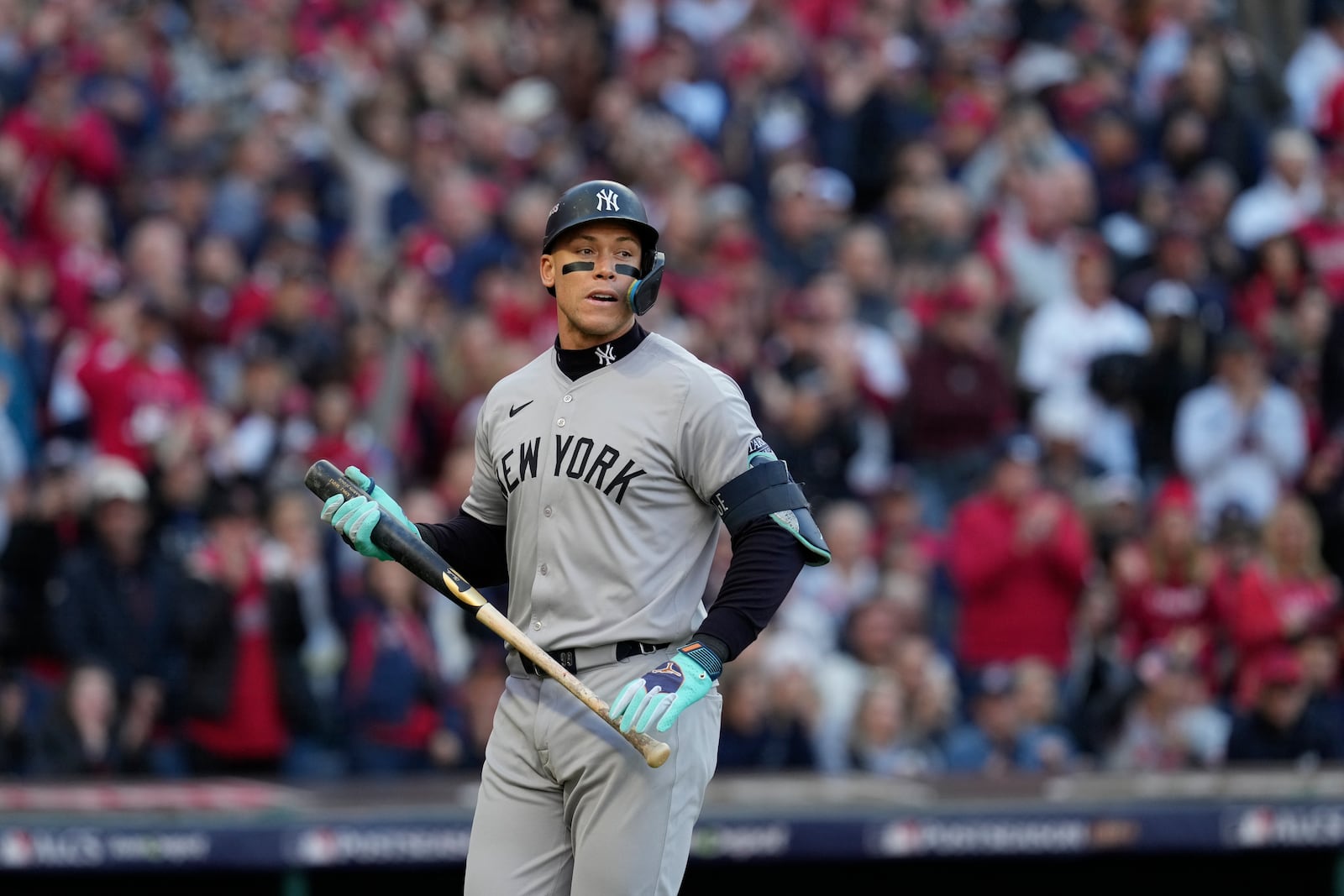 New York Yankees' Aaron Judge reacts after striking out against the Cleveland Guardians during the first inning in Game 3 of the baseball AL Championship Series Thursday, Oct. 17, 2024, in Cleveland.(AP Photo/Godofredo Vásquez )