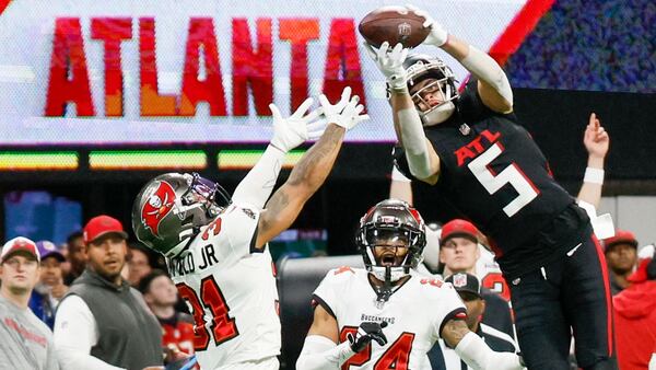 Atlanta Falcons wide receiver Drake London (5) goes up for an impressive reception during the fourth quarter against the Tampa Bay Buccaneers on Sunday, Dec. 10, 2023,  at Mercedes-Benz Stadium in Atlanta. 
Miguel Martinez/miguel.martinezjimenez@ajc.com