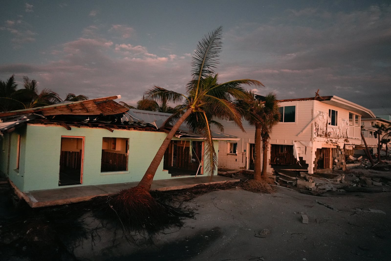 Damaged homes are seen on Manasota Key, Fla., following the passage of Hurricane Milton, Saturday, Oct. 12, 2024. (AP Photo/Rebecca Blackwell)