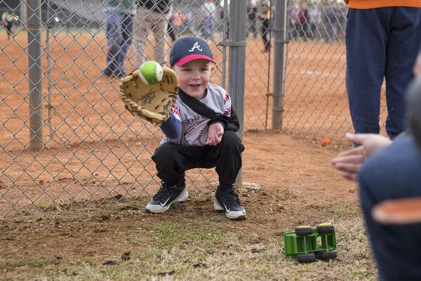 Carter Abernathy plays catch at Manning Mill Park in Adairsville. ALYSSA POINTER / ALYSSA.POINTER@AJC.COM