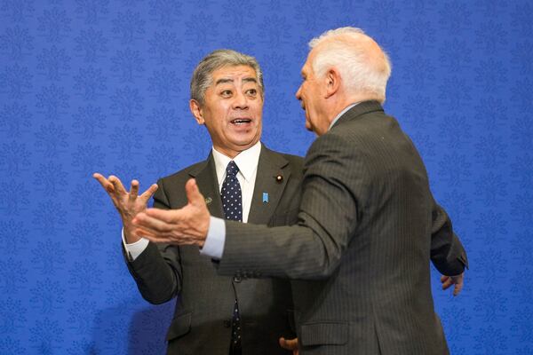 Japanese Foreign Minister Takeshi Iwaya, left, talks to European Union foreign policy chief Josep Borrell after a family photo at the G7 of foreign Ministers in Fiuggi, some 70 kilometers south-east of Rome, Tuesday, Nov. 26, 2024. (AP Photo/Alessandra Tarantino, Pool)