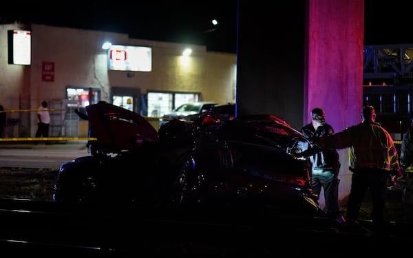 Atlanta police investigate a fatal crash near Lee Street and Tucker Avenue early Sunday. The crash occurred late Saturday. 