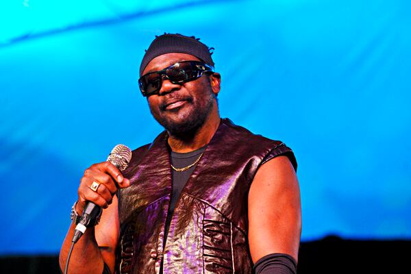 FILE - In this Oct. 27, 2012 file photo, Toots Hibbert of Toots and the Maytals performs during The Voodoo Experience at City Park in New Orleans.  In a statement from a family member, Hibbert died on Friday, Sept. 11, 2020.  (Photo by Amy Harris/Invision/AP, File)