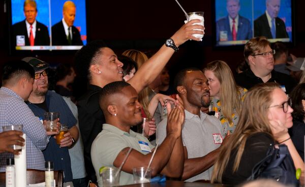 Guests of the Atlanta Young Republicans and Greater Georgia gather at Hudson’s Grille Thursday June 27, 2024 to watch the first 2024 presidential debate between Donald Trump and Joe Biden.