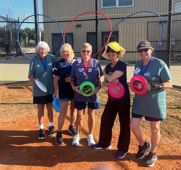 Gladys Mixon stands among her competitors in the Frisbee event. The Golden Games provide a variety of activities for older adults of all physical abilities and fitness levels. (Courtesy of Gladys Mixon)