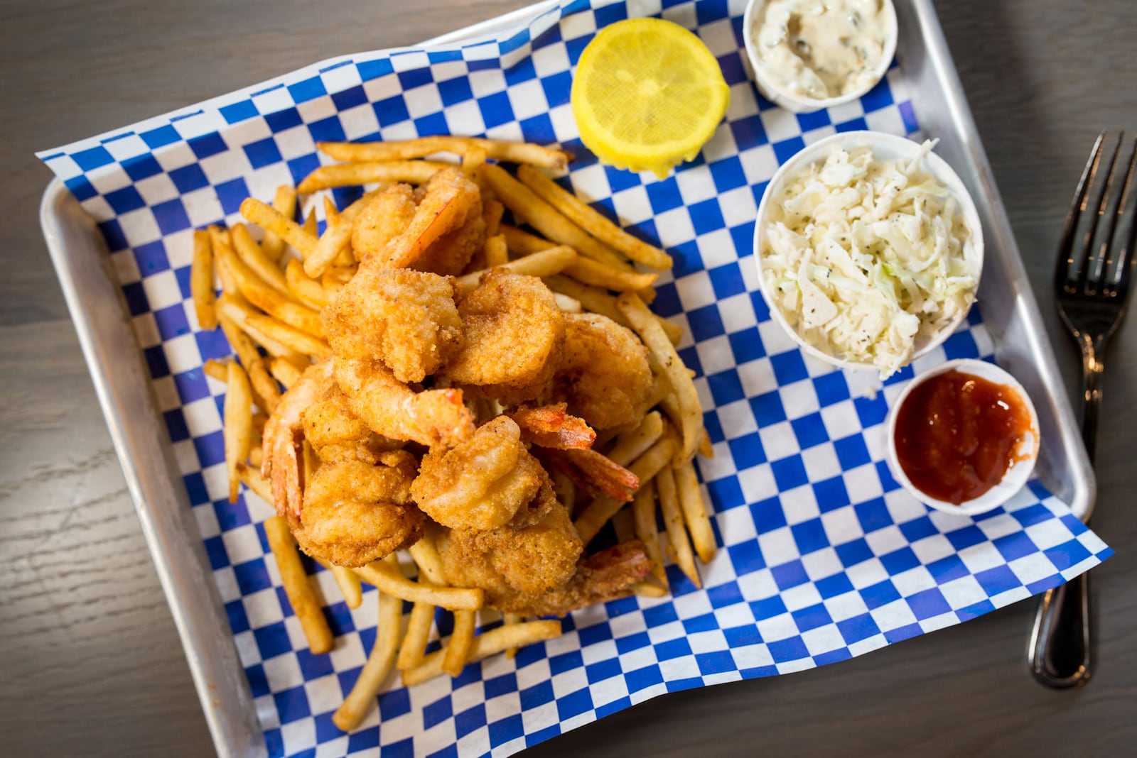  Fried seafood basket with fresh Gulf shrimp, fries and slaw. Photo credit- Mia Yakel.