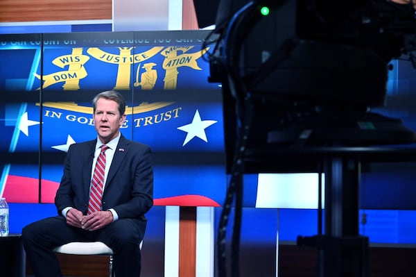 Gov. Brian Kemp speaks during a town hall meeting to discuss the growing coronavirus pandemic that airs live on WSB-TV Channel 2, CBS46, Georgia Public Broadcasting, 11 Alive, FOX 5 Atlanta and Univision 34 Atlanta at WSB-TV Channel 2 on Thursday night, March 26, 2020. (Hyosub Shin / Hyosub.Shin@ajc.com)