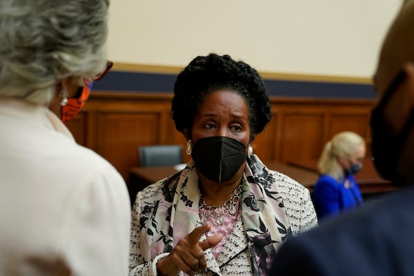 Rep. Sheila Jackson Lee (D-Texas) talks with others on Capitol Hill in Washington on Wednesday. Jackson is the lead sponsor of a reparations bill first proposed in 1989 by the late Rep. John Conyers Jr. (D-Michigan). 