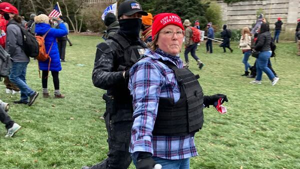 Lisa Marie Eisenhart, a nurse from Woodstock, was arrested in the Capitol riot and is the mother of Eric Munchel, who has also been charged.