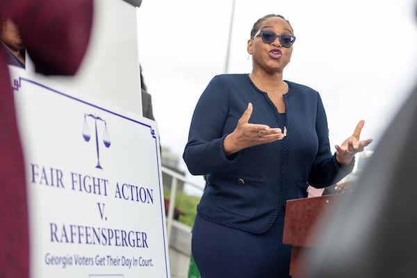 Allegra Lawrence-Hardy, an attorney for Fair Fight Action, speaks outside the Richard B. Russell Federal Building in Atlanta on April 11, 2022. A Washington think-tank that was quoted in a Politico article about payments made by the voting rights organization Fair Fight Action to outside counsel has issued a retraction. (Jenn Finch for the AJC)
