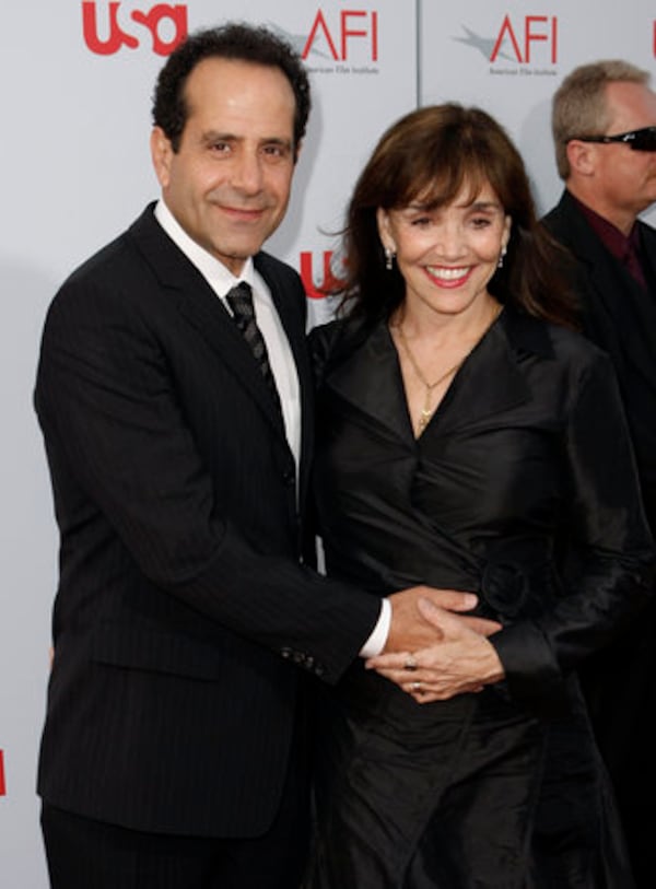 "Monk" star Tony Shalhoub and Brooke Adams get cozy on the red carpet.