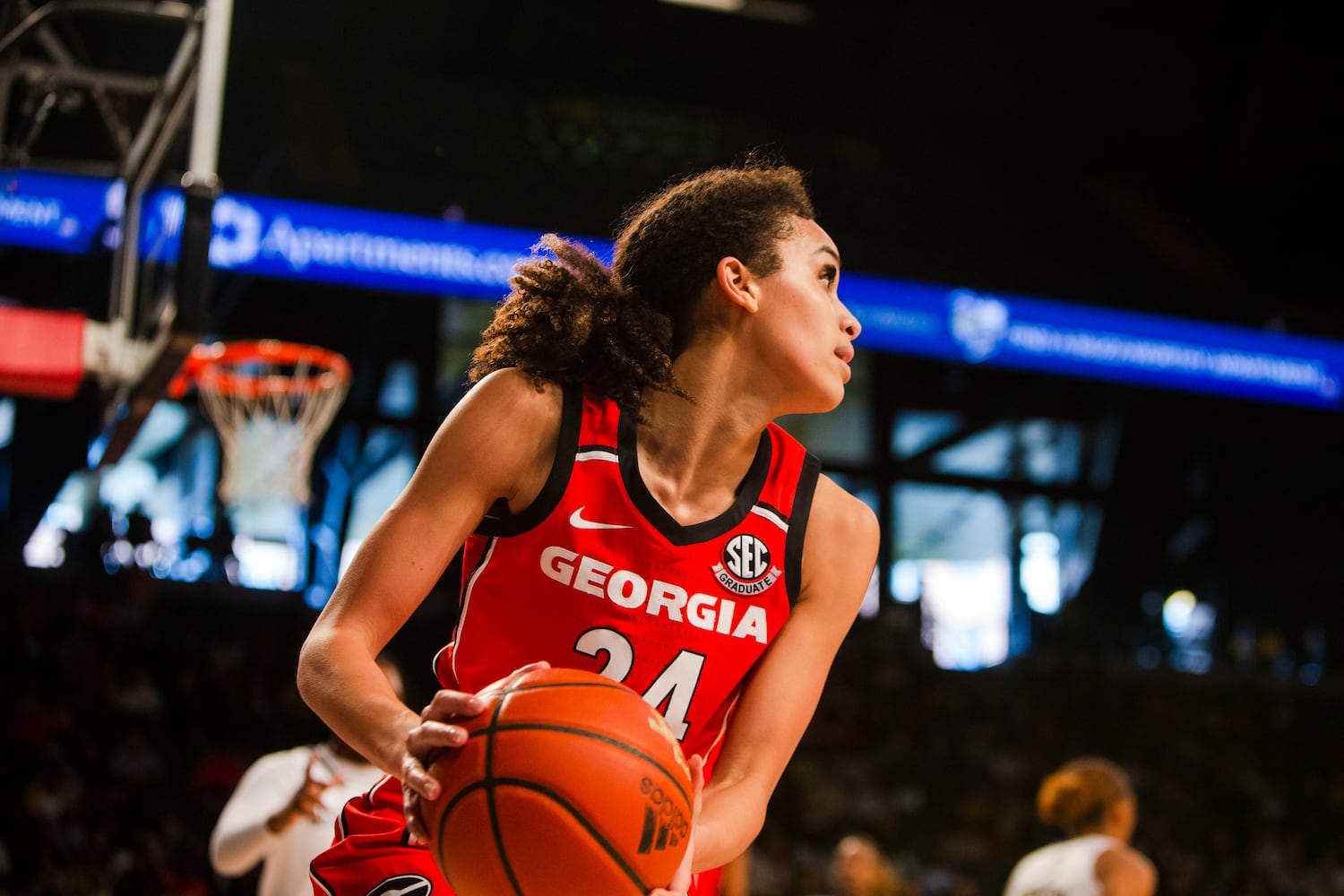 UGA forward Brittney Smith looks for an open teammate during their women's basketball game against Georgia Tech on Sunday in Atlanta. (CHRISTINA MATACOTTA / FOR THE ATLANTA JOURNAL-CONSTITUTION)