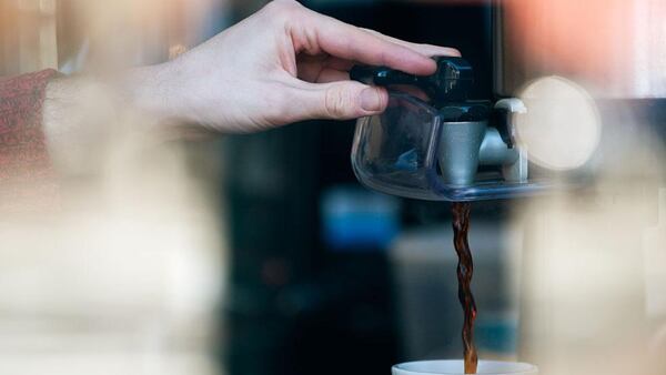 A barista pours a cup of coffee at Colson Patisserie on February 22, 2016 in the Brooklyn borough of New York City. (Photo by Bryan Thomas/Getty Images)